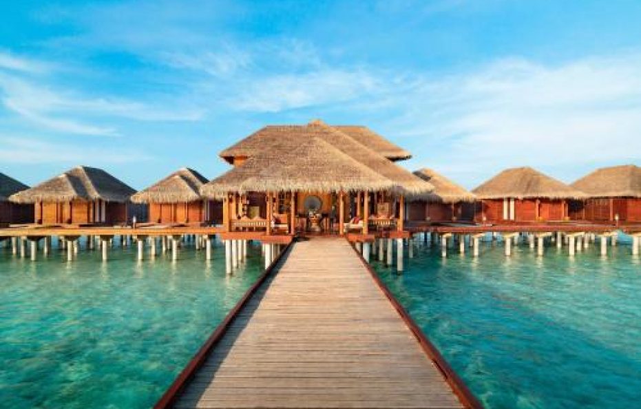 Sunset Over Water Villa