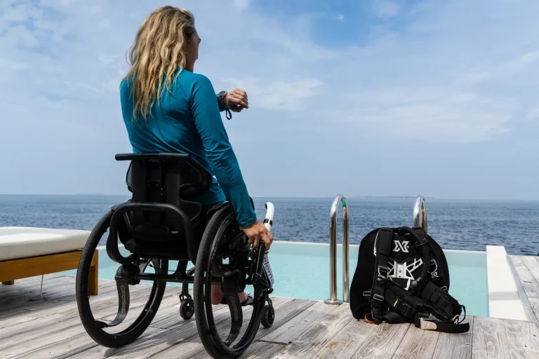 Amilla Maldives Resort and Residences, Baa Atoll: wheelchair user on a villa deck, part of the accessibility programme