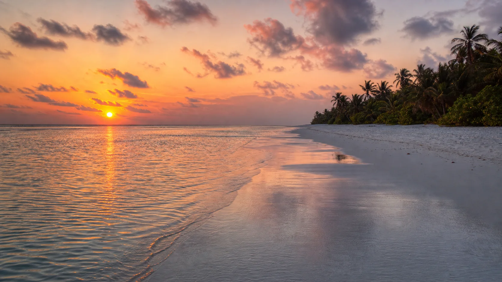 Sunset over Fulhadhoo Bikini Beach in the Maldives