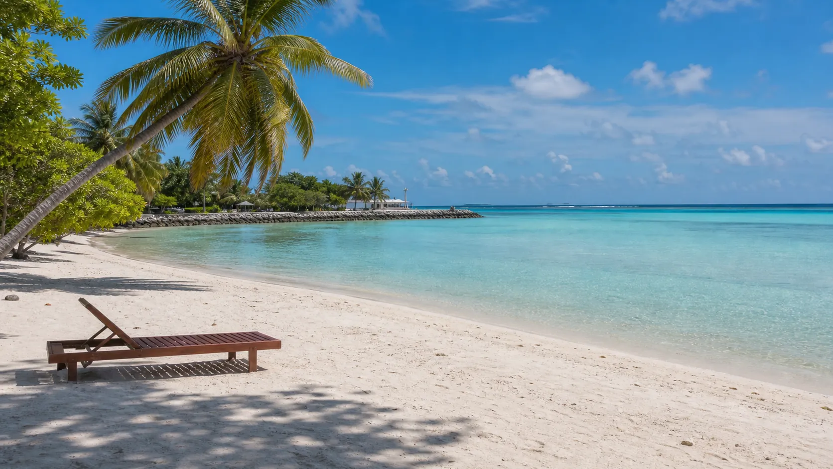 Gulhi Bikini Beach with soft white sand, a sun lounger and shallow turquoise water