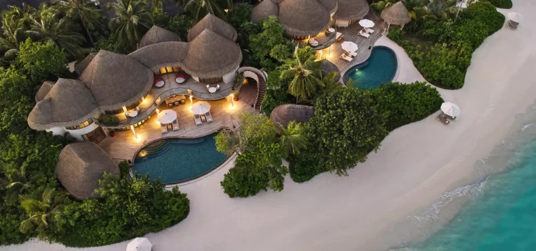 Aerial view of a beach residence with a private pool at The Nautilus Maldives, Baa Atoll