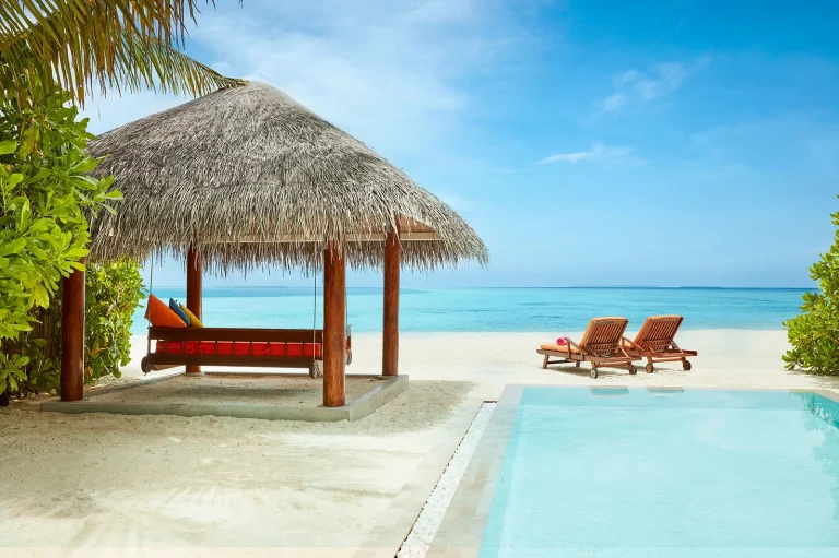 Overwater villa with a private pool and deck over the lagoon at Sun Siyam Vilu Reef, Dhaalu Atoll
