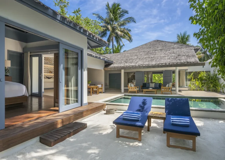 Private pool, loungers and open bedroom of a Family Beach Pool Villa at The Halcyon Private Isles, Gaafu Alifu Atoll, Maldives